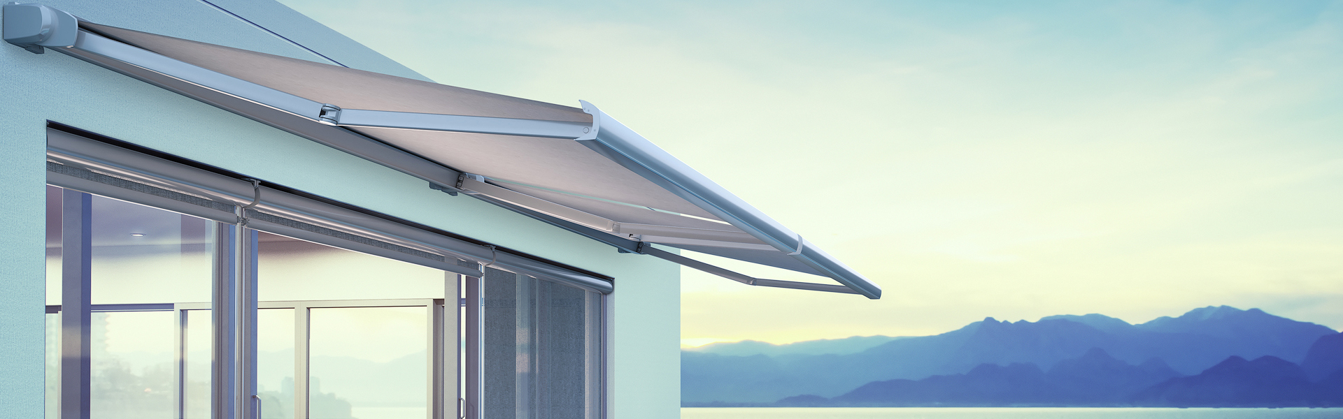 Minimalist modern villa exterior with infinity pool and beautiful ocean view at dawn.