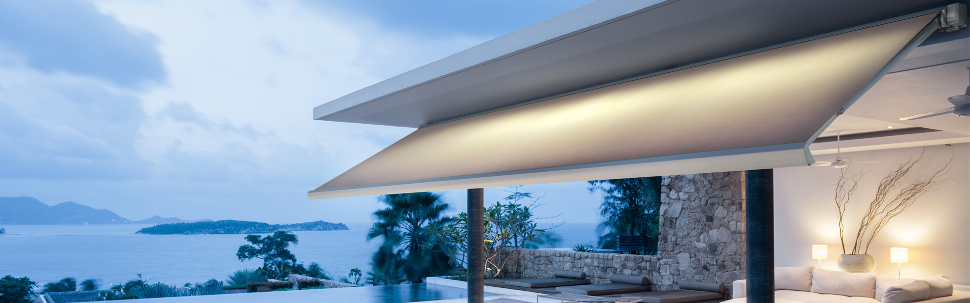 Luxury Island Home With Infinity Pool At Dusk.